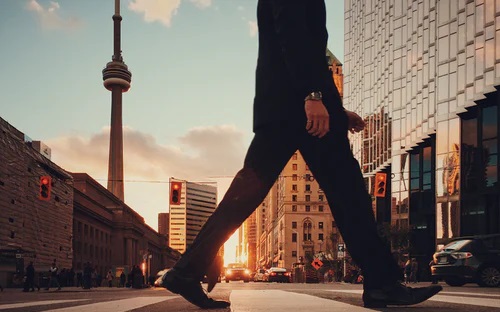 Man Walking In City