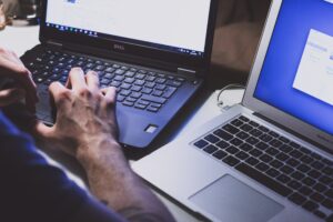 person working on laptop image