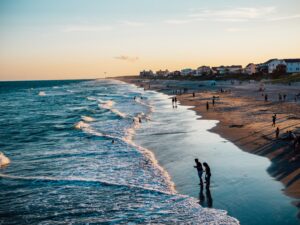 A beach scene at sundown