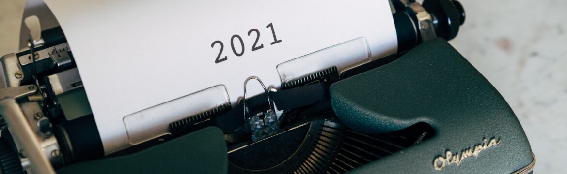 Typewriter with 2021 typed on a sheet of paper