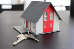 house keys and model home on table